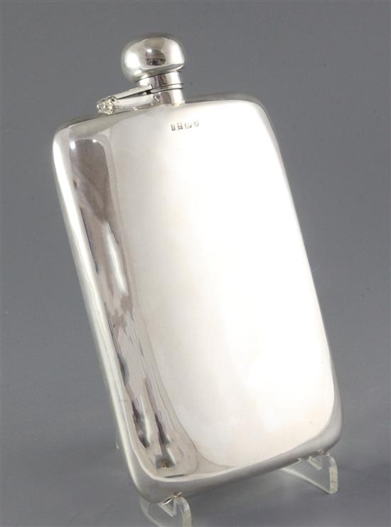 An early 1990s large silver pocket flask, 17.7 oz.